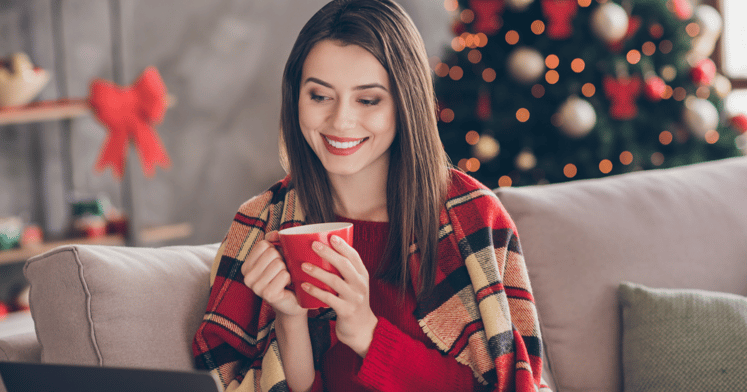 Female guest enjoying a hybrid event during the festive season