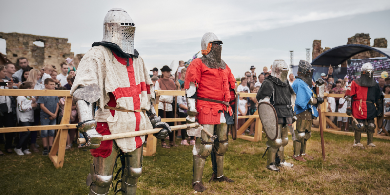 Historical reenactment of knights with swords and shields