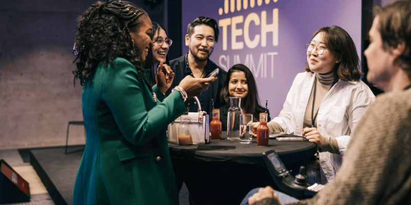Business People and Entrepreneurs Networking at a Tech Summit