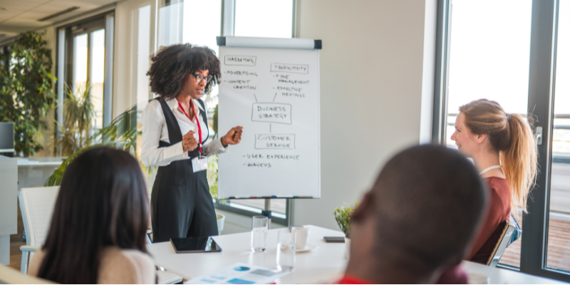 A team of multicultural professional exchange ideas during a business meeting