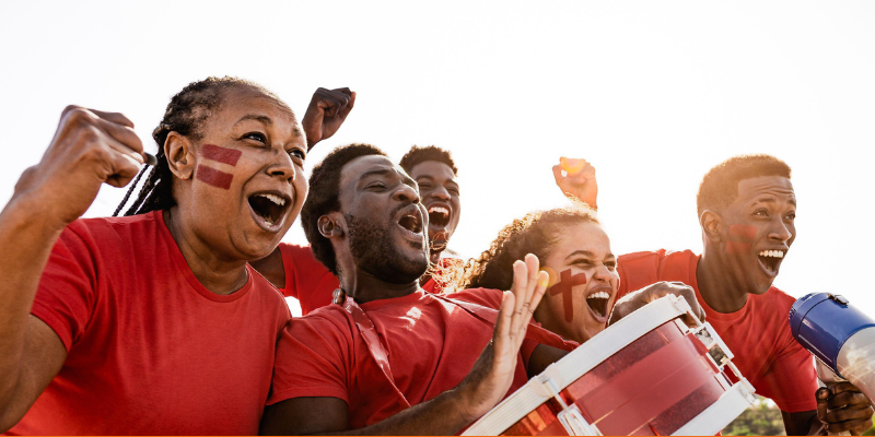 Football fans having fun cheering their favorite team