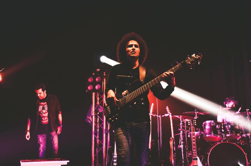 Man playing electric guitar on stage