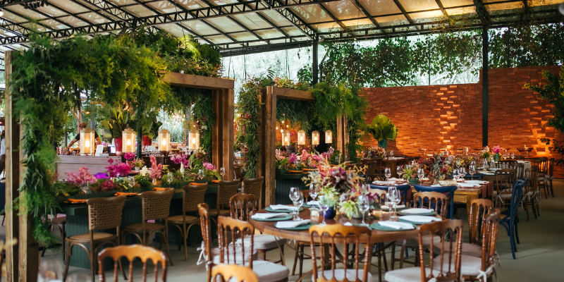 Beautiful event venue decorated with greenery and flowers