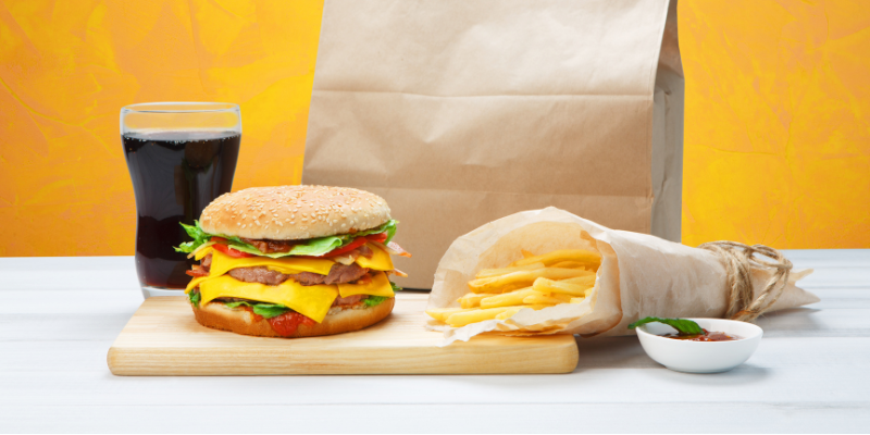 Fast food takeaway with hamburger, soda, and fries