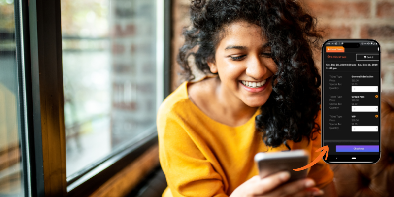 Smiling Indian woman using mobile phone at a coffee shop with mobile mockup of a Passage ticketing page overlayed next to her phone