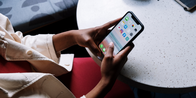 Close-up of a person holding a smartphone.